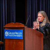 faculty at podium